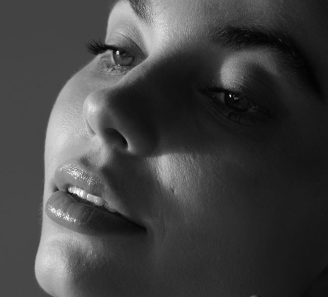 Black and white portrait of a woman.