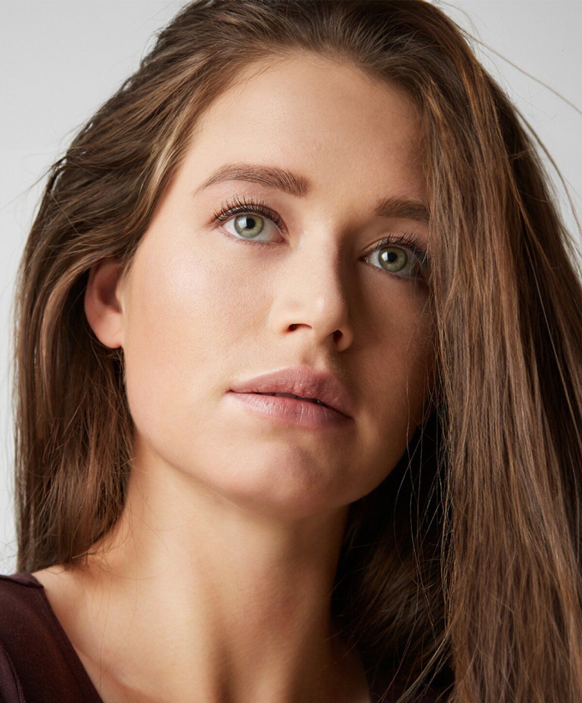 Close-up of a person with long hair.