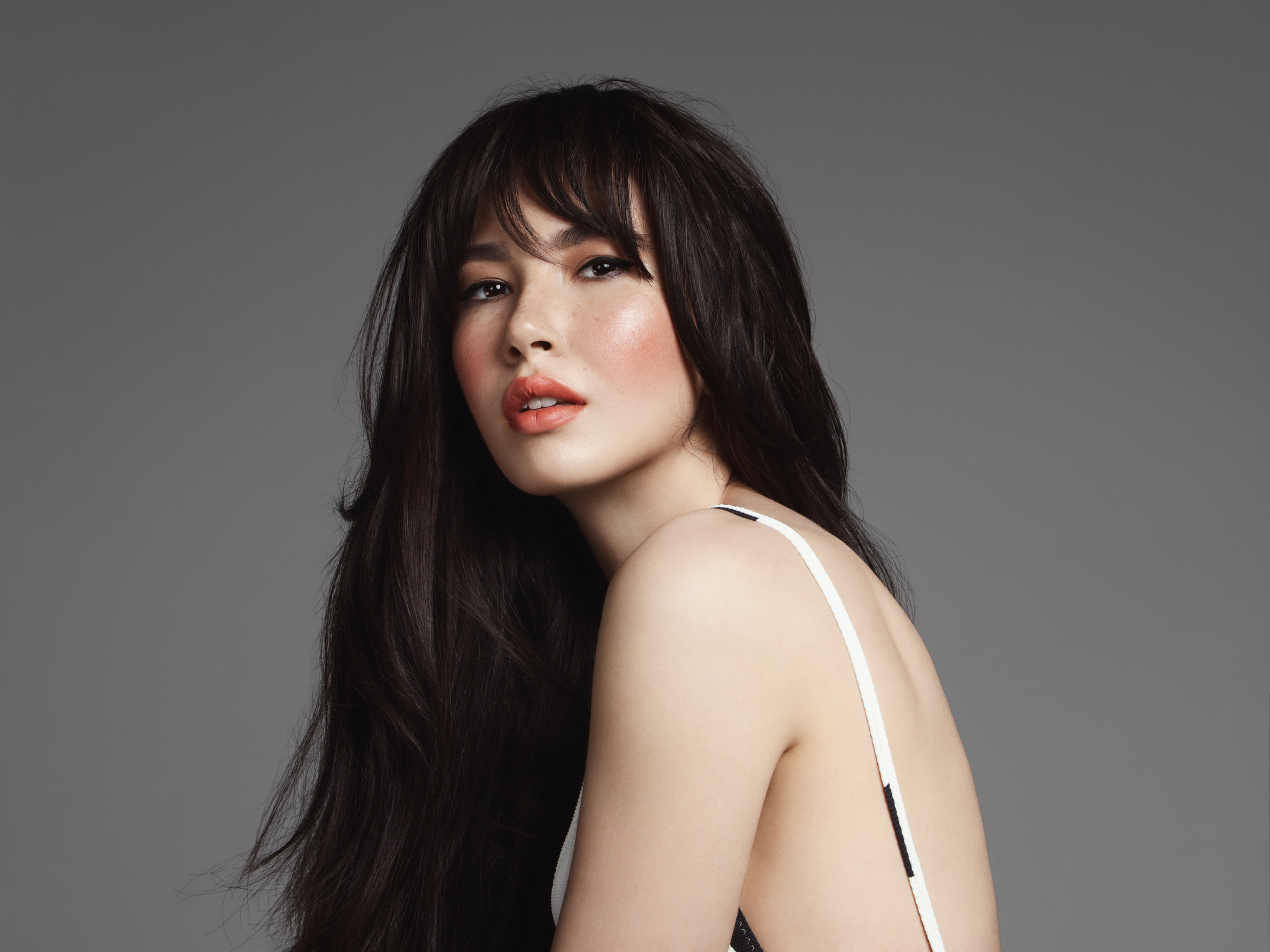 Portrait of a woman with long dark hair