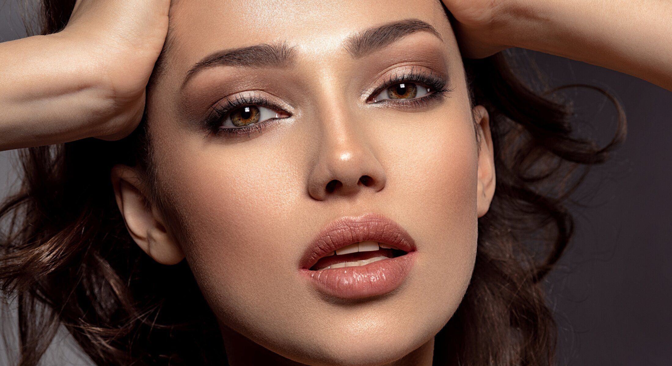 Close-up portrait of a woman with makeup.