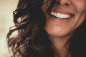 close up of woman's mouth smiling